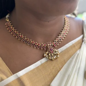 leaf motif red stone necklace with pearl drops – antique gold traditional jewellery